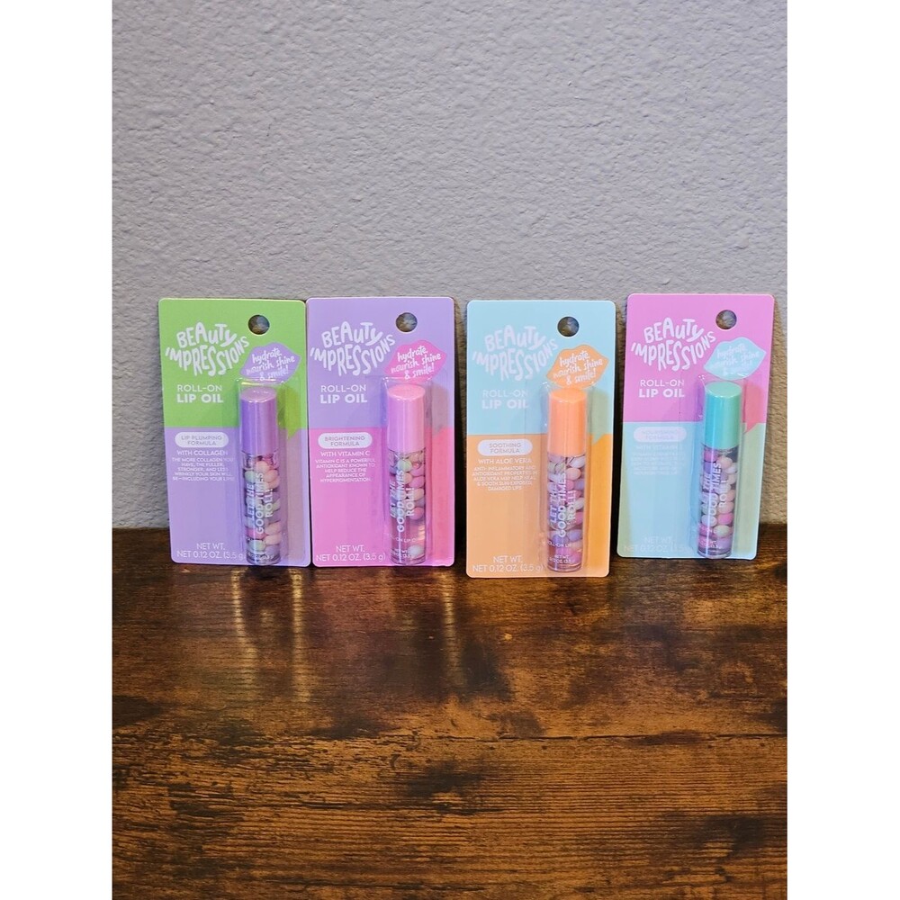NWT Beauty Impressions Roll-On Lip Oil Bundle